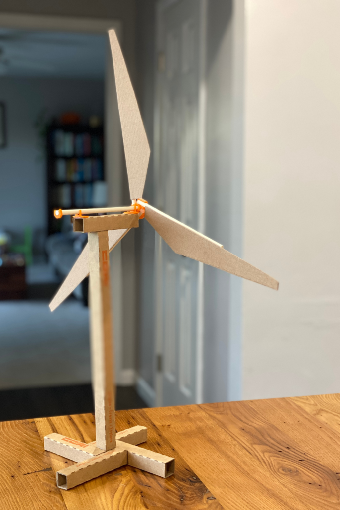 cardboard windmill on tabletop
